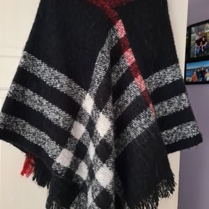 Poncho. Black  Grey and red